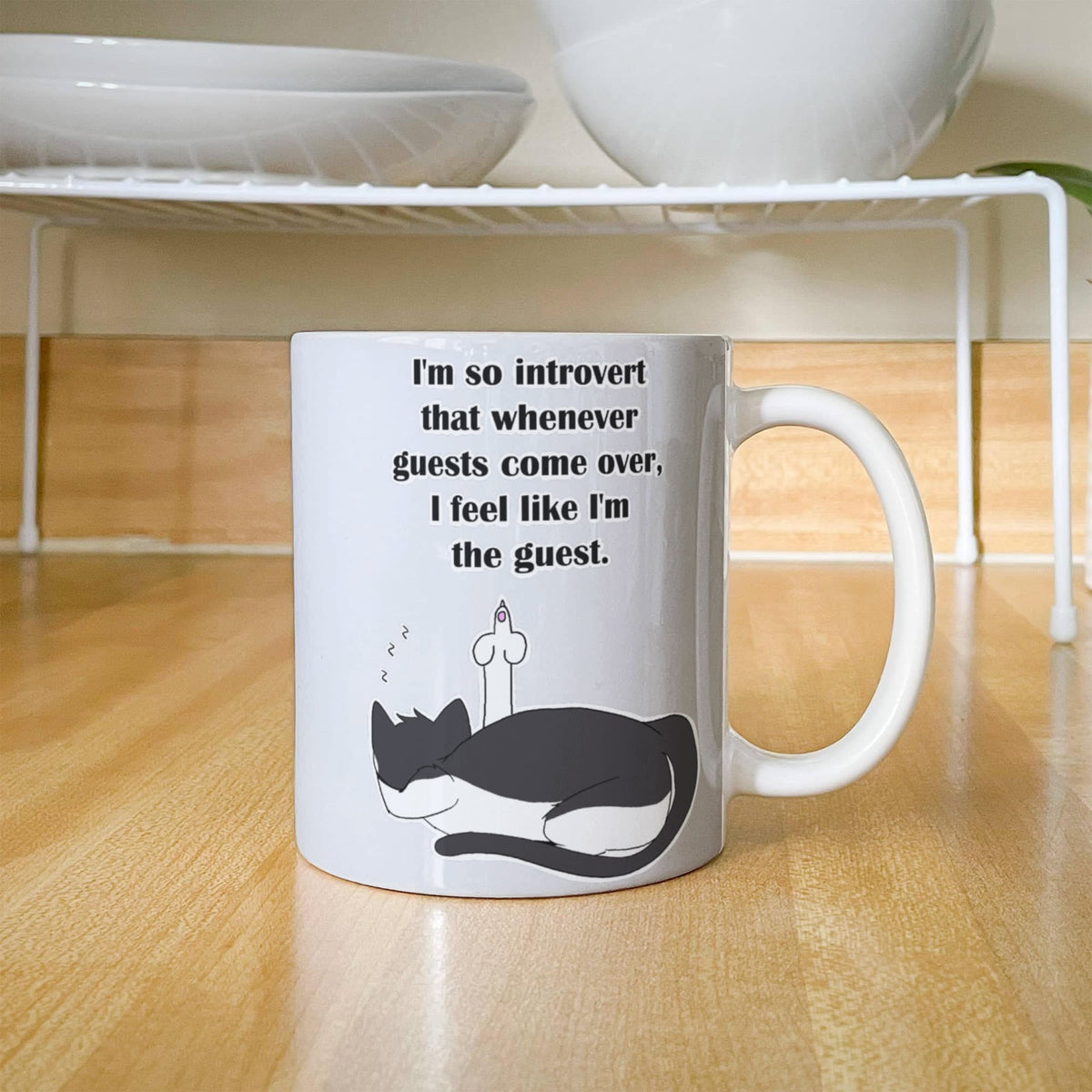 When Guests Arrive, I Become the Guest — Funny Introvert Cat White Mug